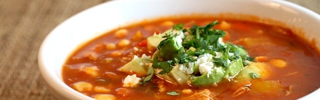 Spicy chili chicken soup with avocado